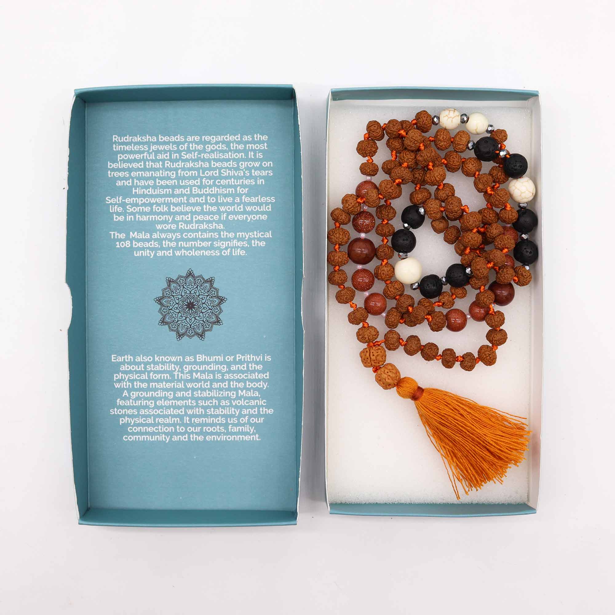 Mala Rudraksha «Σταθερότητα & Γείωση» - φυσικοί σπόροι - 108 χάντρες με πορτοκαλί φούντα Διαστάσεις: 0,5 εκ - mykarma.gr