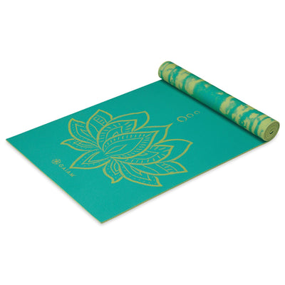 Gaiam  Reversible Στρωμα Yoga Turquoise Lotus - 2 Διαφορέτικα σχέδια στο ίδιο στρώμα(2 όψεις) Διαστάσεις: Μήκος: 173 εκ Πλάτος: 61 εκ Πάχος: 6 mm - mykarma.gr